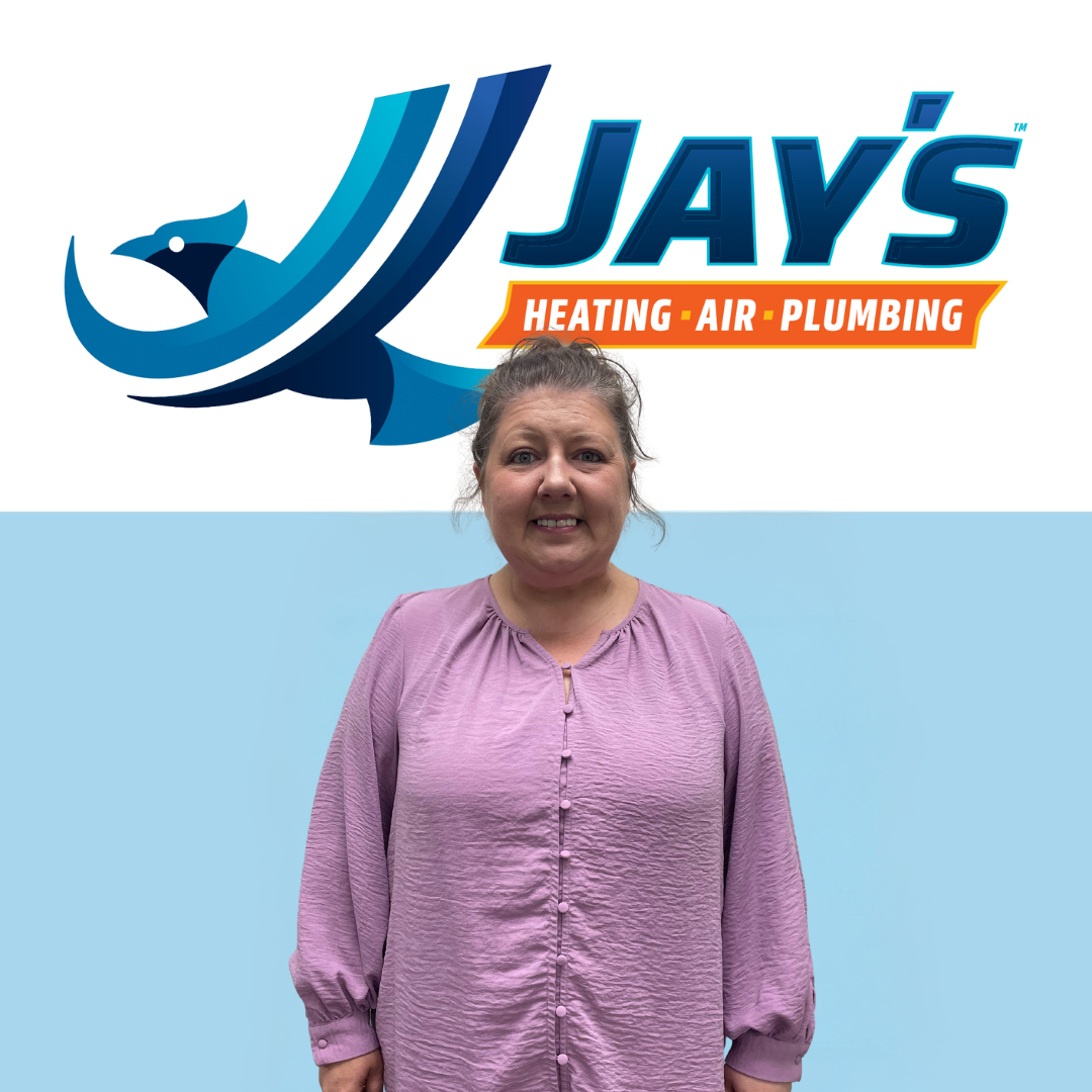 A person in a purple blouse stands in front of Jay's Heating, Air, Plumbing logo featuring a stylized bird, embodying the 5-star quality and expertise that our technicians deliver every day.