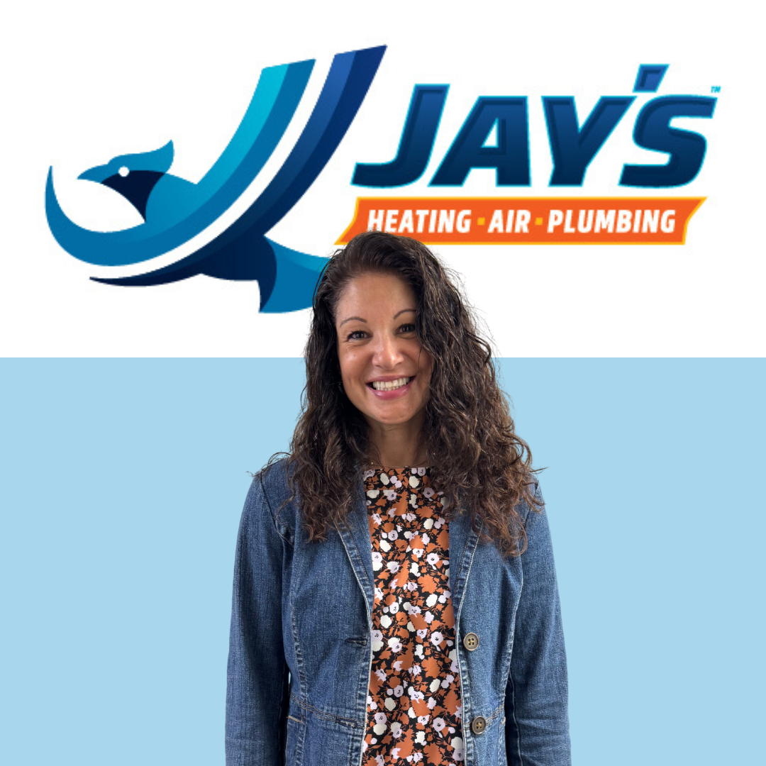 A person with curly hair, wearing a floral top and denim jacket, stands smiling in front of a blue and white "Jay's Heating Air Plumbing" logo, representing the company's 5-star service and commitment to quality technicians.