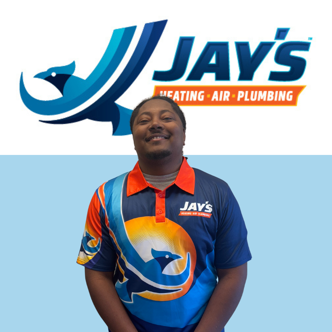 A smiling person in a colorful shirt, featuring the "Jay's Heating, Air, Plumbing" logo, stands proudly in front of the matching company emblem on a gradient blue background. As one of our quality technicians, they symbolize our commitment to excellence and reliable service.